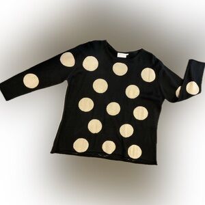 Bring on the dots! Black sweater with polka dots.